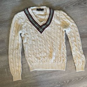 Polo ralph lauren, cream sweater with red and green trim.